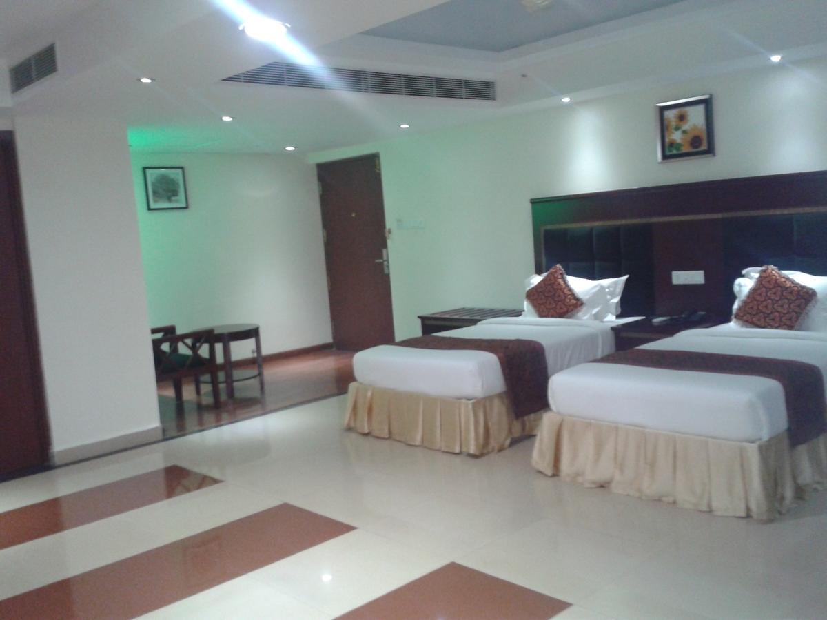 Hotel Hiton Perintalmanna Quarto foto